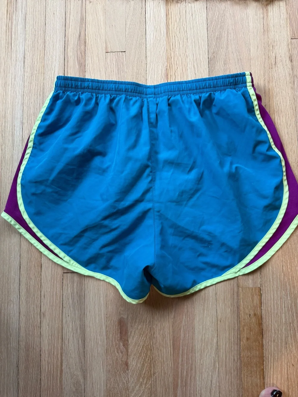 Nike Women's Teal Running Shorts with Purple Panels & Neon Yellow Trim
